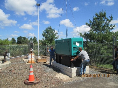 Crane lowering new generator at Pump Station 15 in Buckingham Township, Bucks County, PA