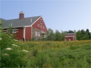 hilltown townsip wastewater treatment facility operations building photo - building looks like a traditional bucks county farm with a meadow in the foreground